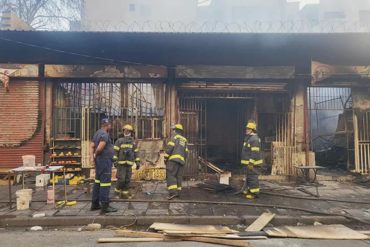 Probe underway after twelve shops gutted by fire in Joburg CBD