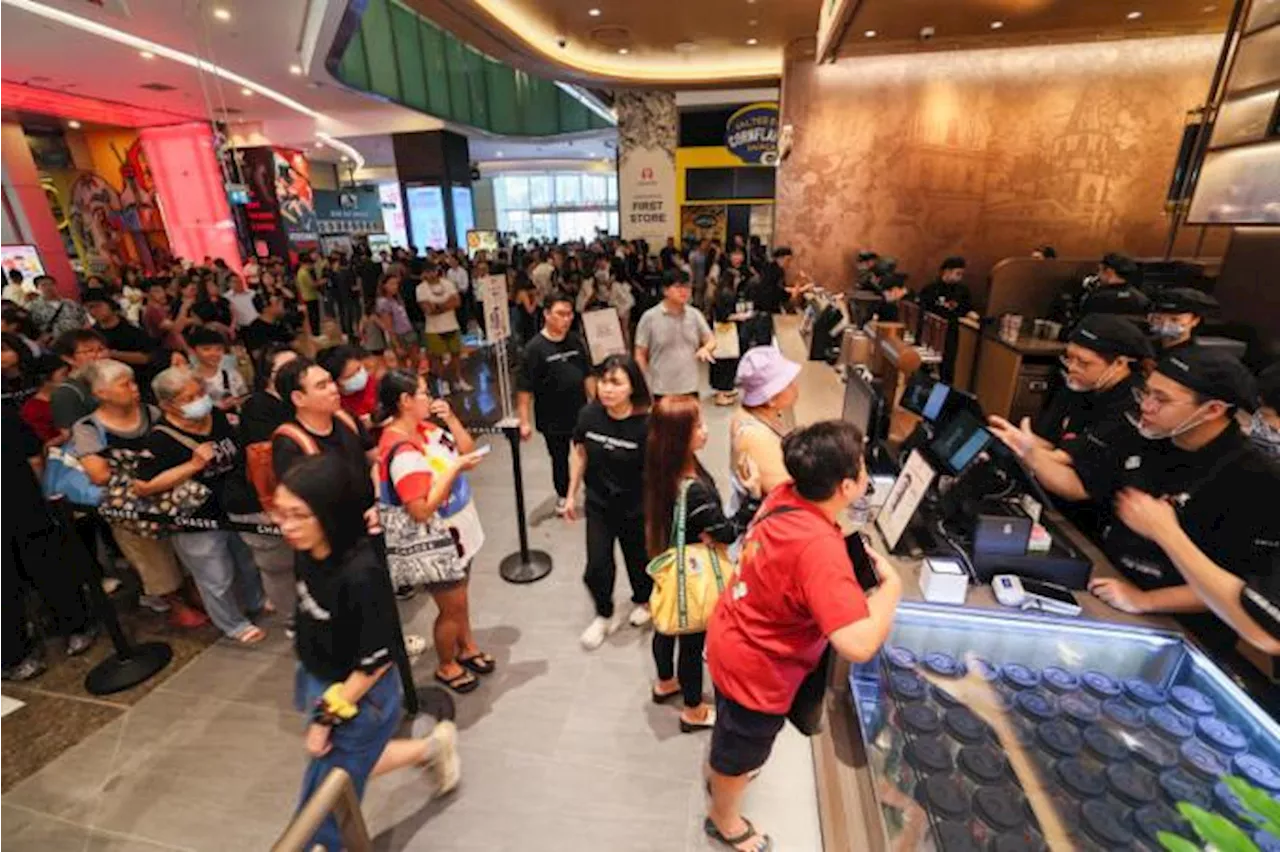 Teatime: Standing in line is almost a sport in Singapore