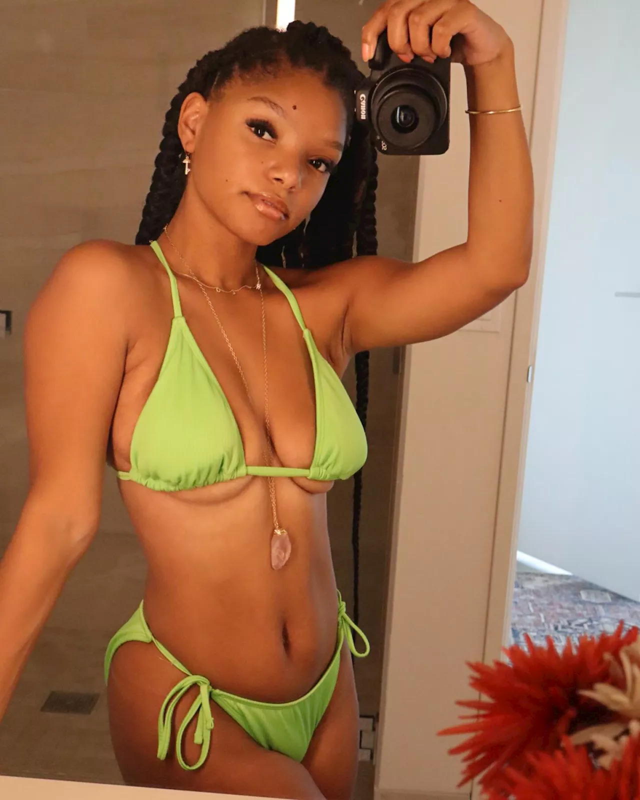 Halle Bailey Is Sexy in an Underboob-Baring Neon Green Bikini