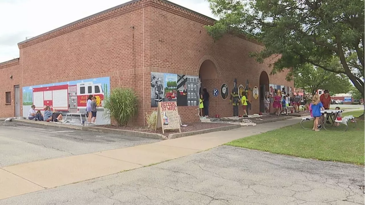 Students finishing new mural at Canandaigua Fire Department station