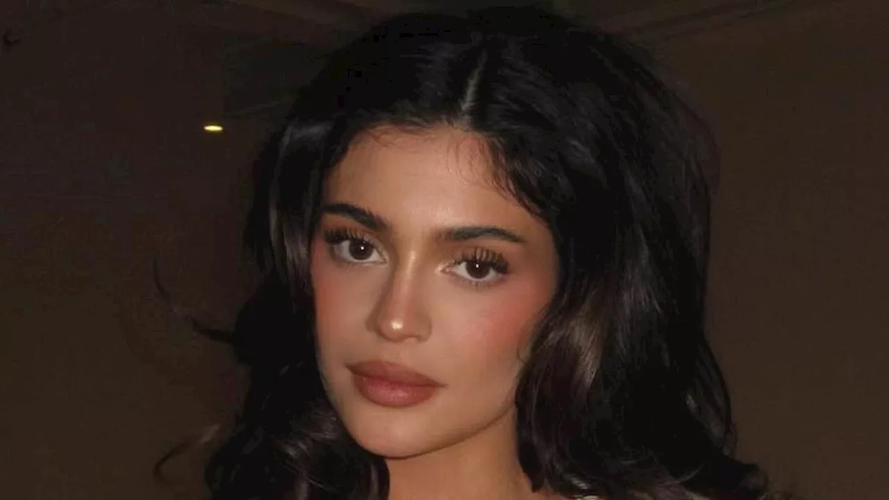 Kylie Jenner addresses rumor she took Ozempic to lose baby weight - as she stuns in busty snaps to...