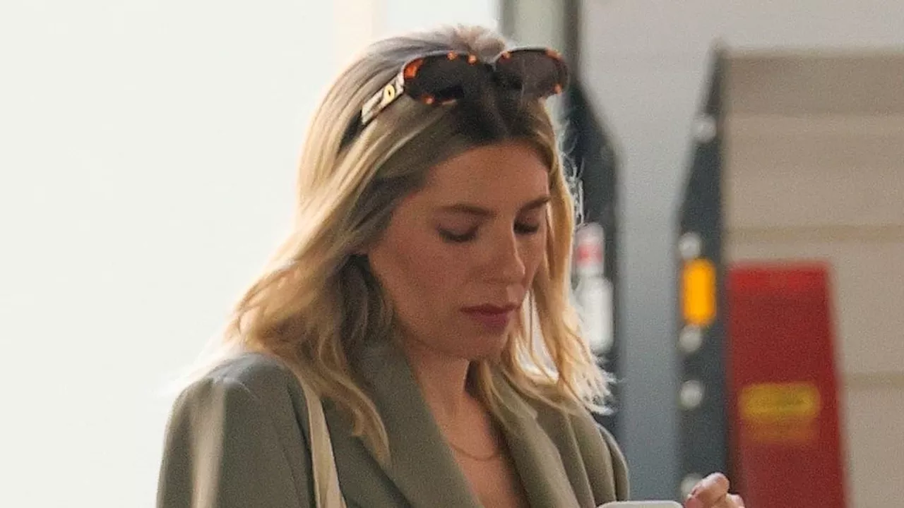 Mollie King is seen for the first time since announcing she is expecting her second child with...