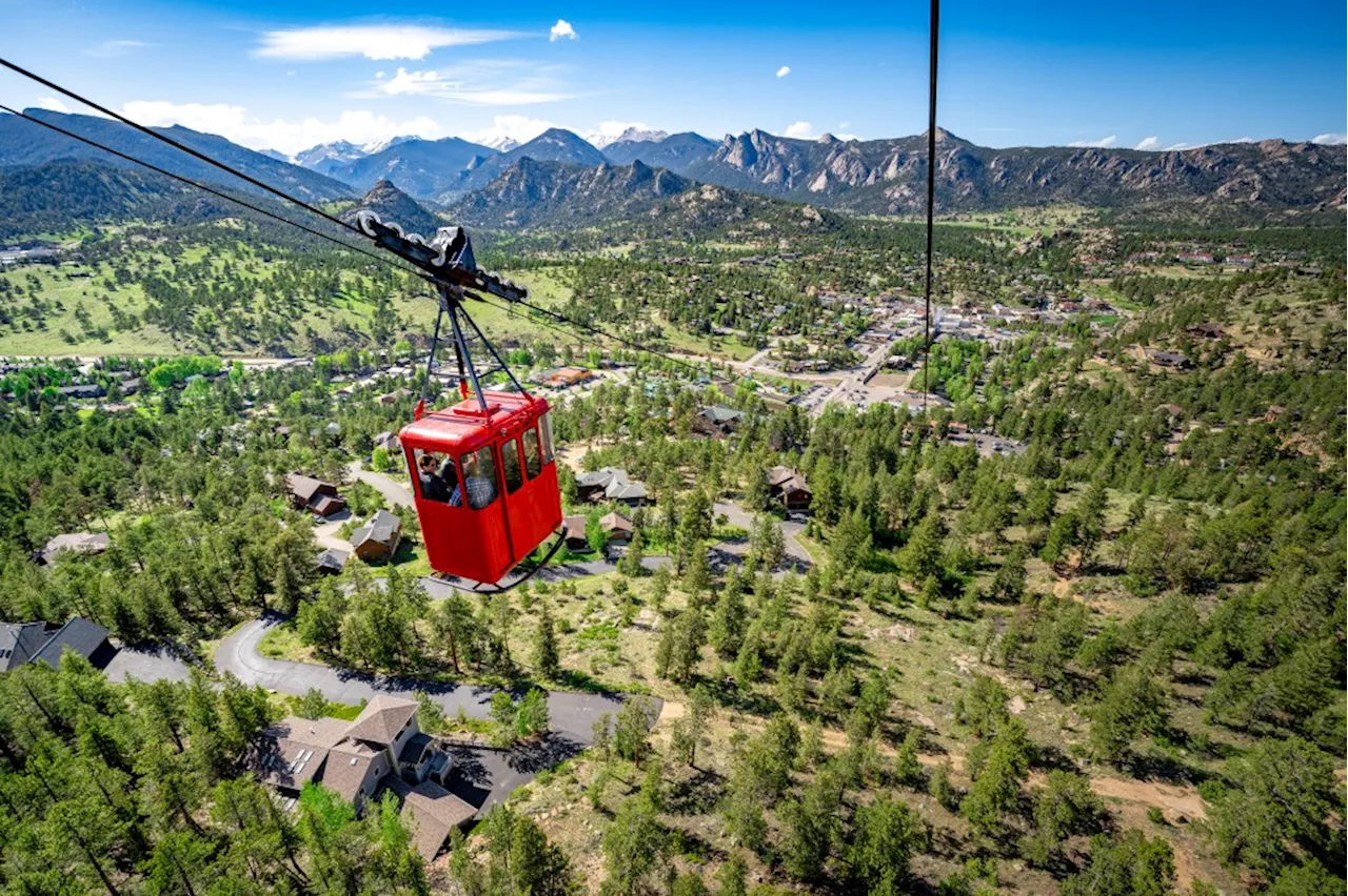 Historic Estes Park Tram overlooking Rocky Mountain National Park back in operation