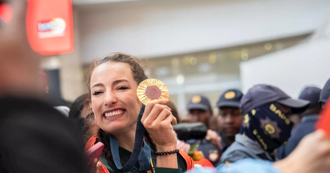 IN PICS: SA Olympic medallists receive spirited welcome at OR Tambo International Airport