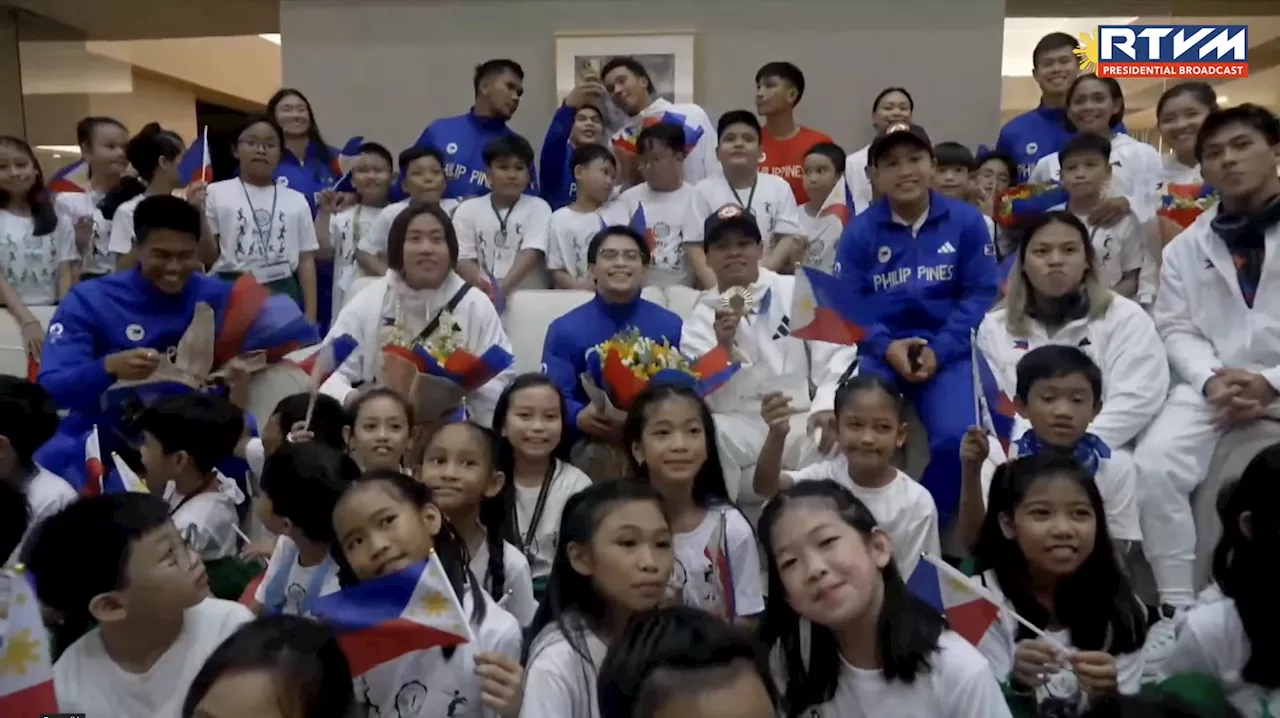 Loved ones, aspiring students greet PH Olympians upon arrival in Manila