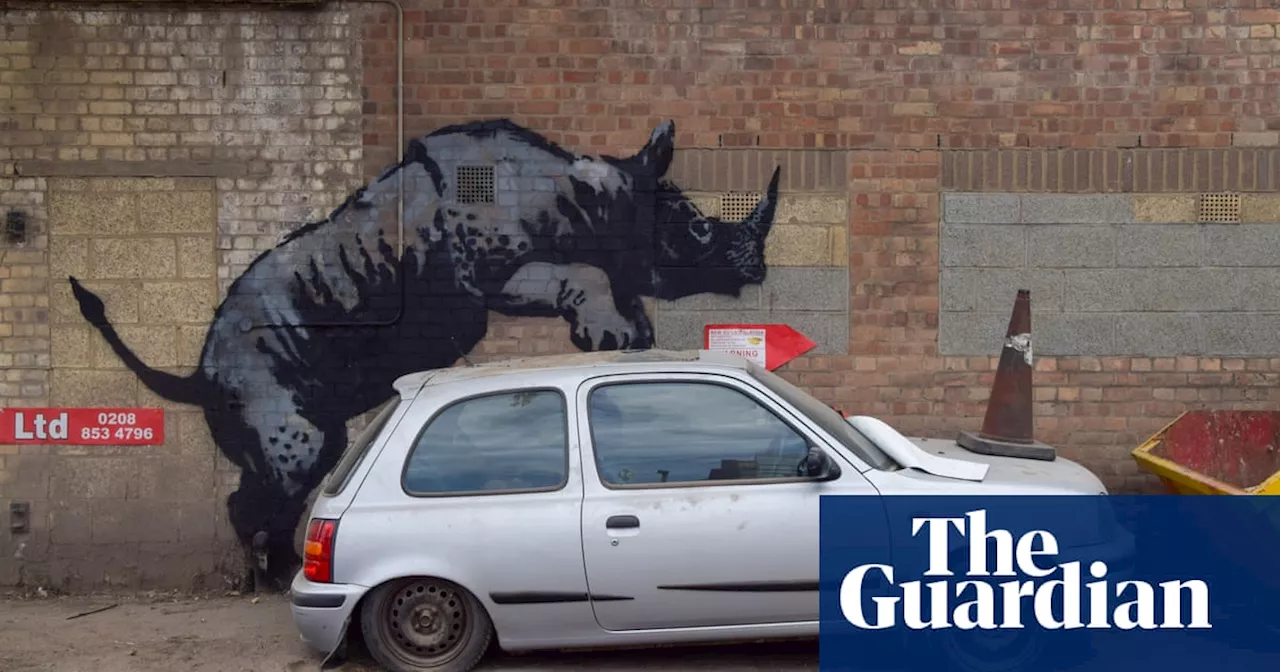 Banksy rhino artwork in London defaced with graffiti tag