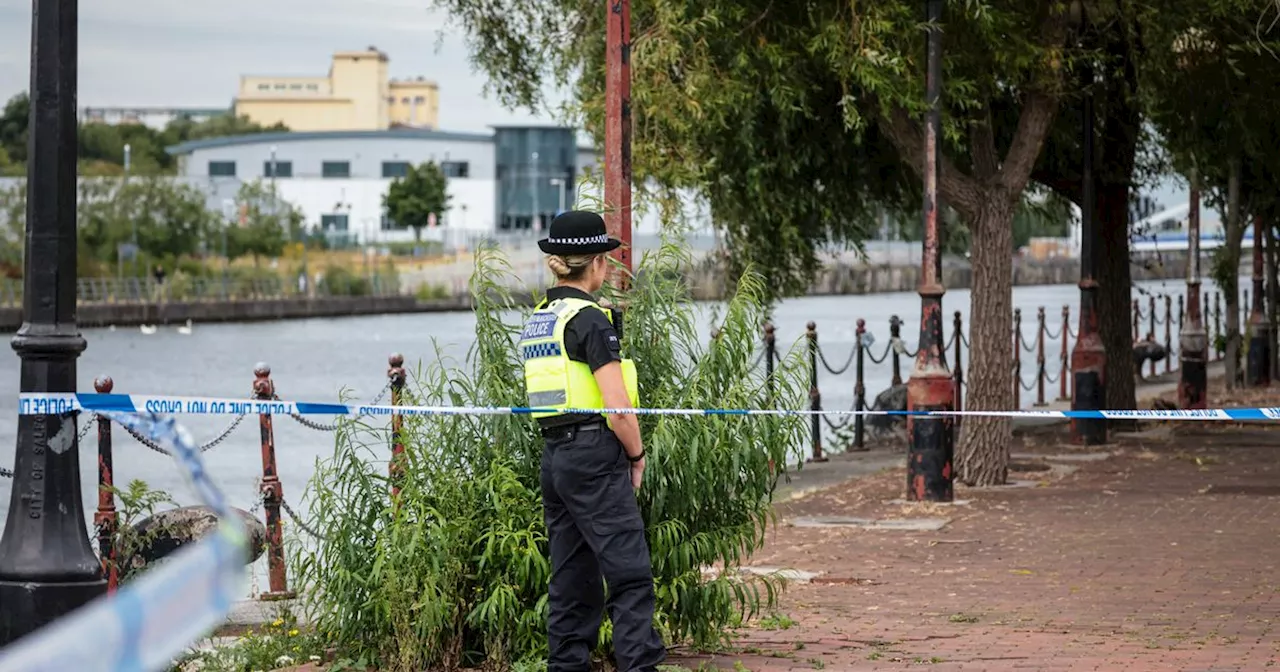 Woman fighting for life after being pulled from water at Salford Quays