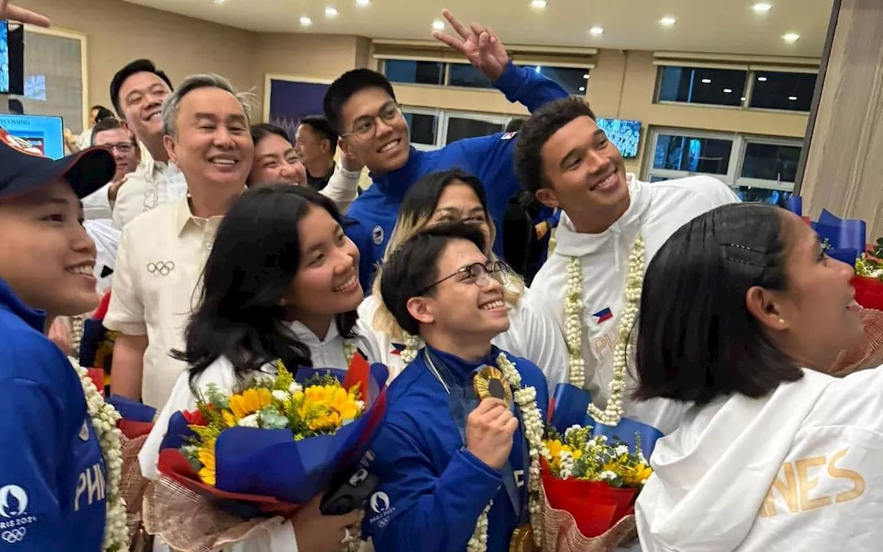 Yulo-led PH delegation in Paris arrives home