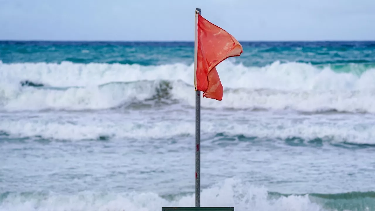 Tropical Storm Ernesto's winds strengthen to near-hurricane force as it departs Puerto Rico