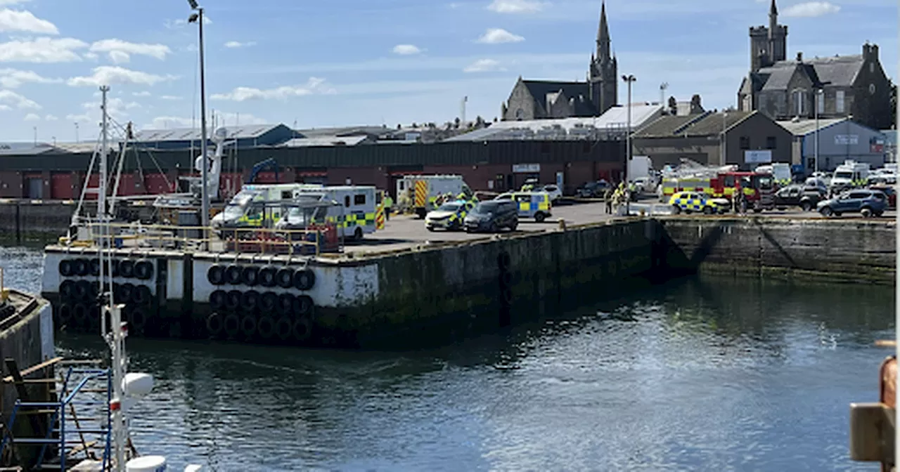 Emergency services swarm Scots harbour amid ongoing incident