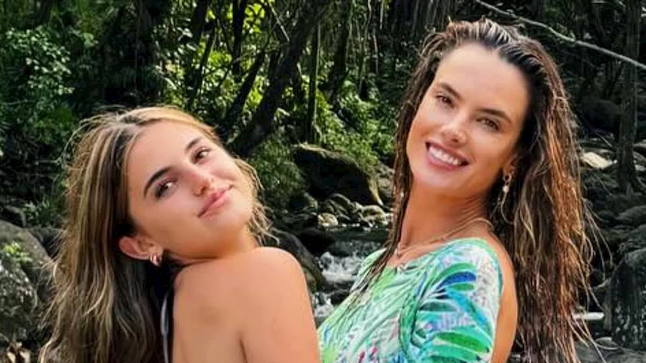 Alessandra Ambrosio, 43, wows in a one-piece swimsuit as she and mini-me daughter Anja, 15, vacation...