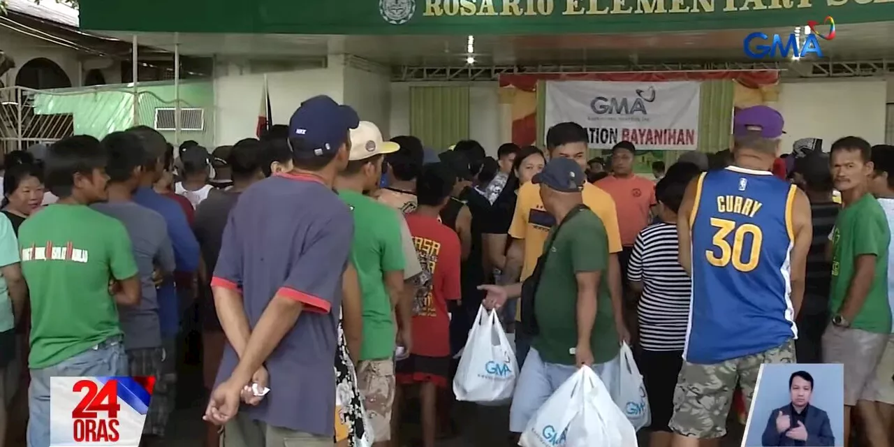 8,000 Bataan, Cavite residents affected by oil spill receive food packs from GMA Kapuso Foundation