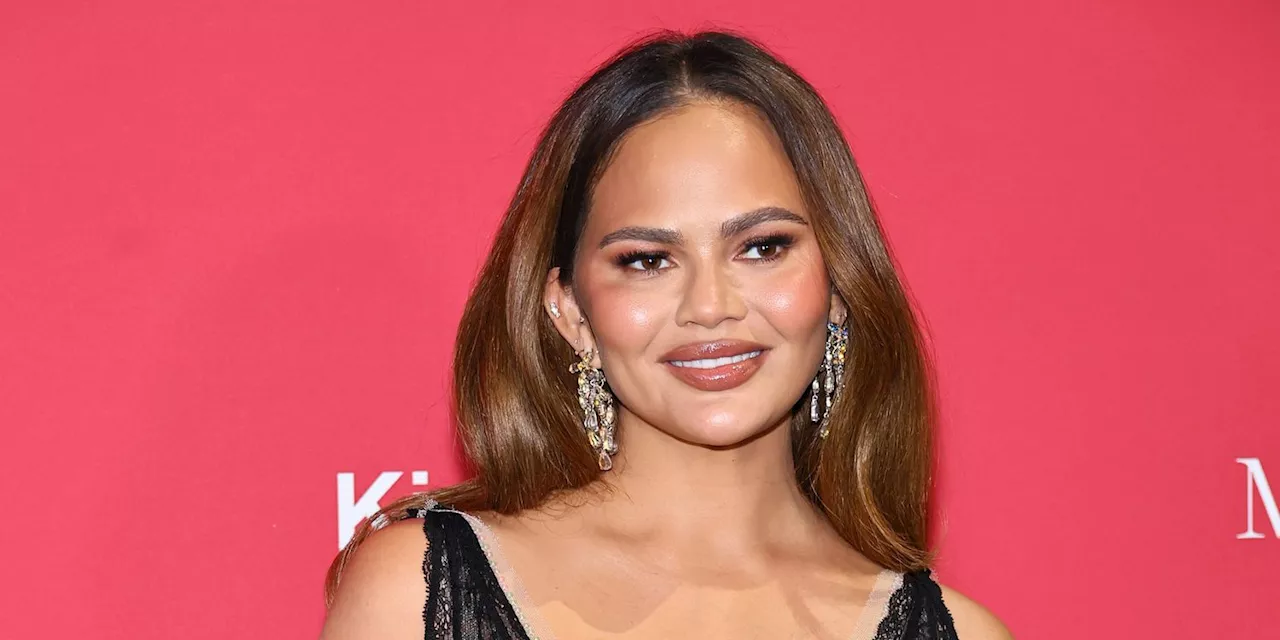 Chrissy Teigen Showed Off Her Surgery Scars in a Low-Cut LBD During Date Night