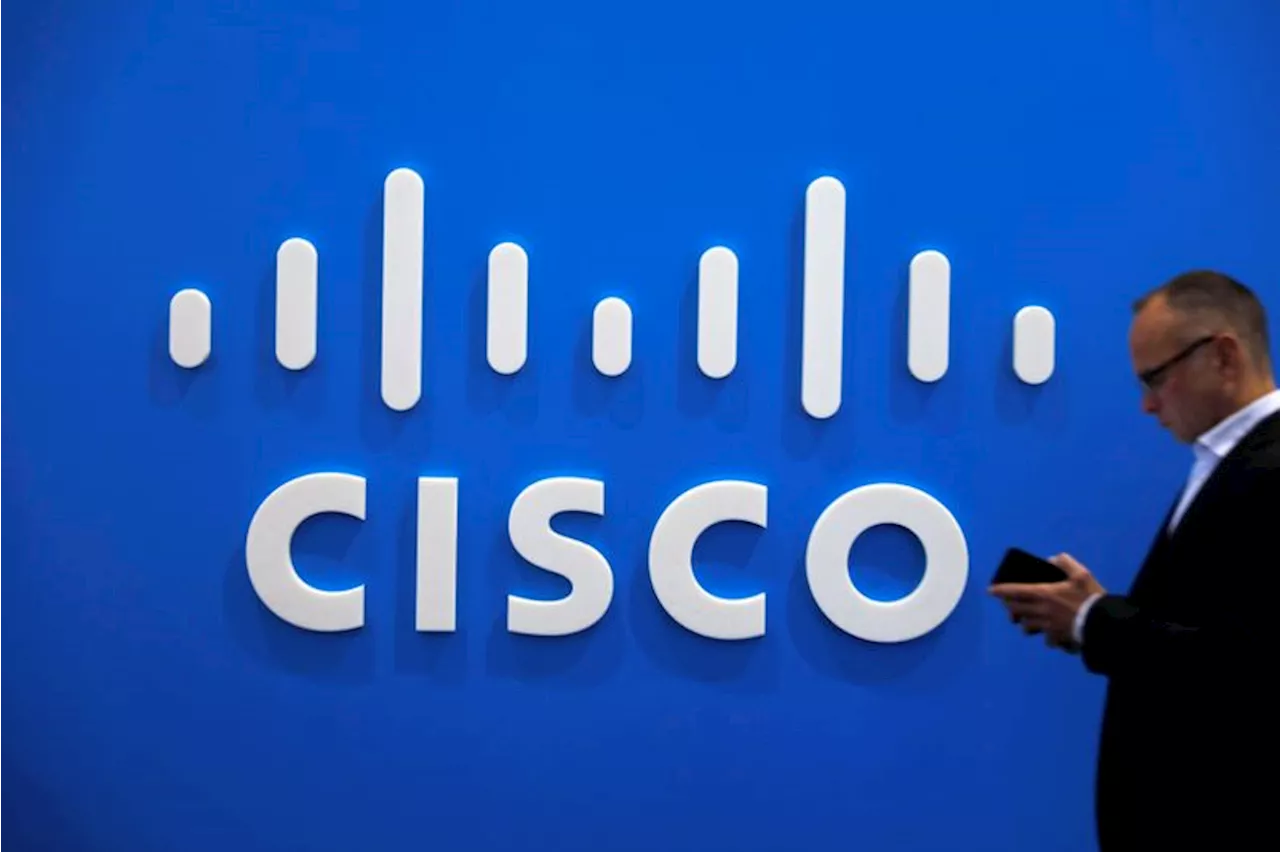 Cisco shares surge on earnings beat and job cuts