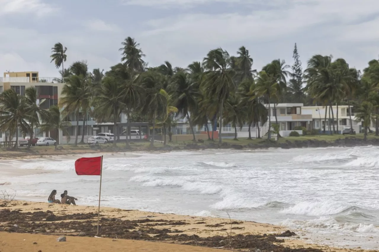 Ernesto becomes a hurricane after pummeling northeast Caribbean and knocking out power in the region