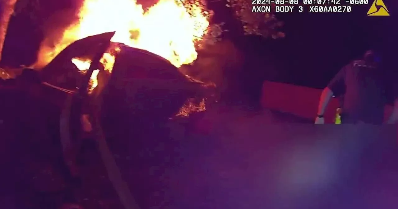 Body cam video shows heroic officers, witness rescuing driver after fiery crash