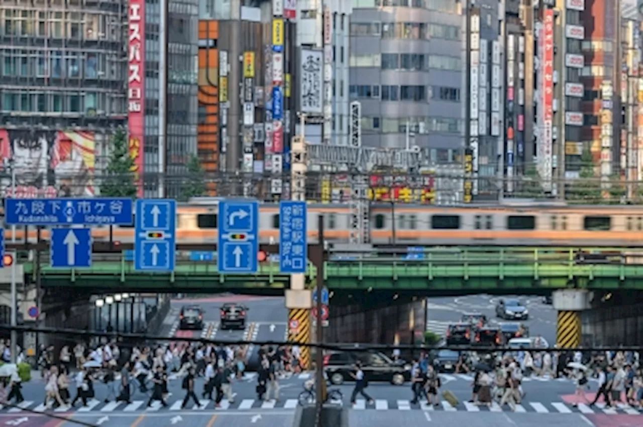 Japan cancels hundreds of flights, trains amid ‘obon’ holiday week as Typhoon Ampil approaches