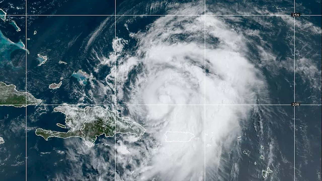 Hurricane Ernesto drops torrential rain on Puerto Rico as it strengthens heading toward Bermuda