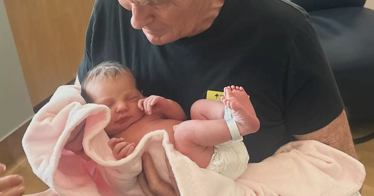 Baywatch icon David Hasselhoff shares he's a grandad as he cradles newborn