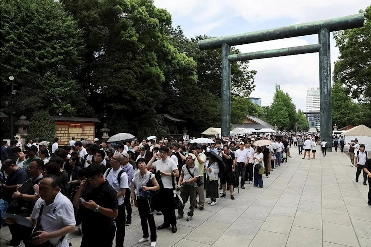 Japan ministers visit controversial war shrine on World War II anniversary