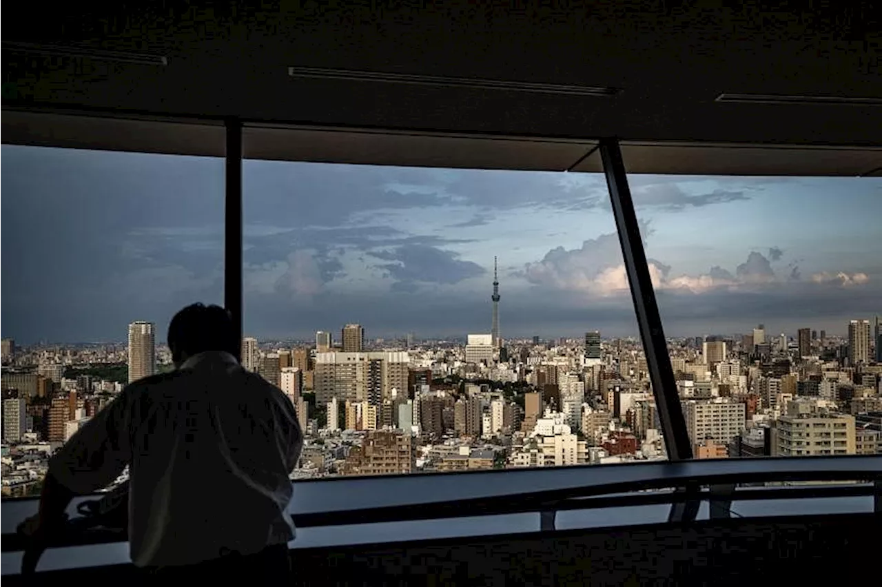 Typhoon Ampil approaches Tokyo, forcing cancellation of flights and train services