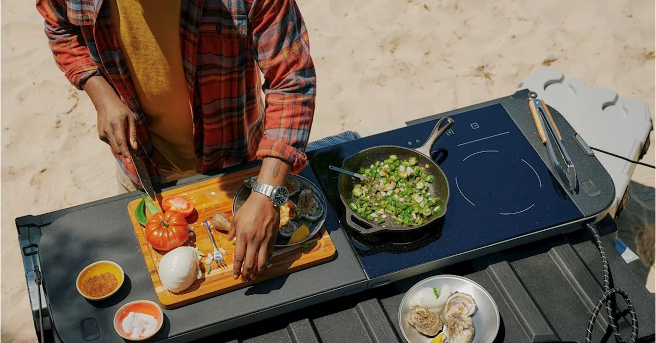 Rivian’s new fold-and-stow electric kitchen lets you cook atop your tailgate