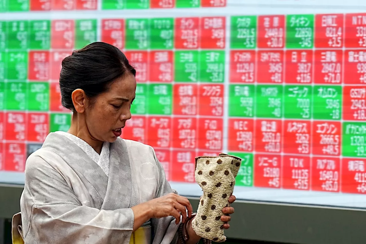 Japanese stocks head for best week in four years as receding growth fears lift markets