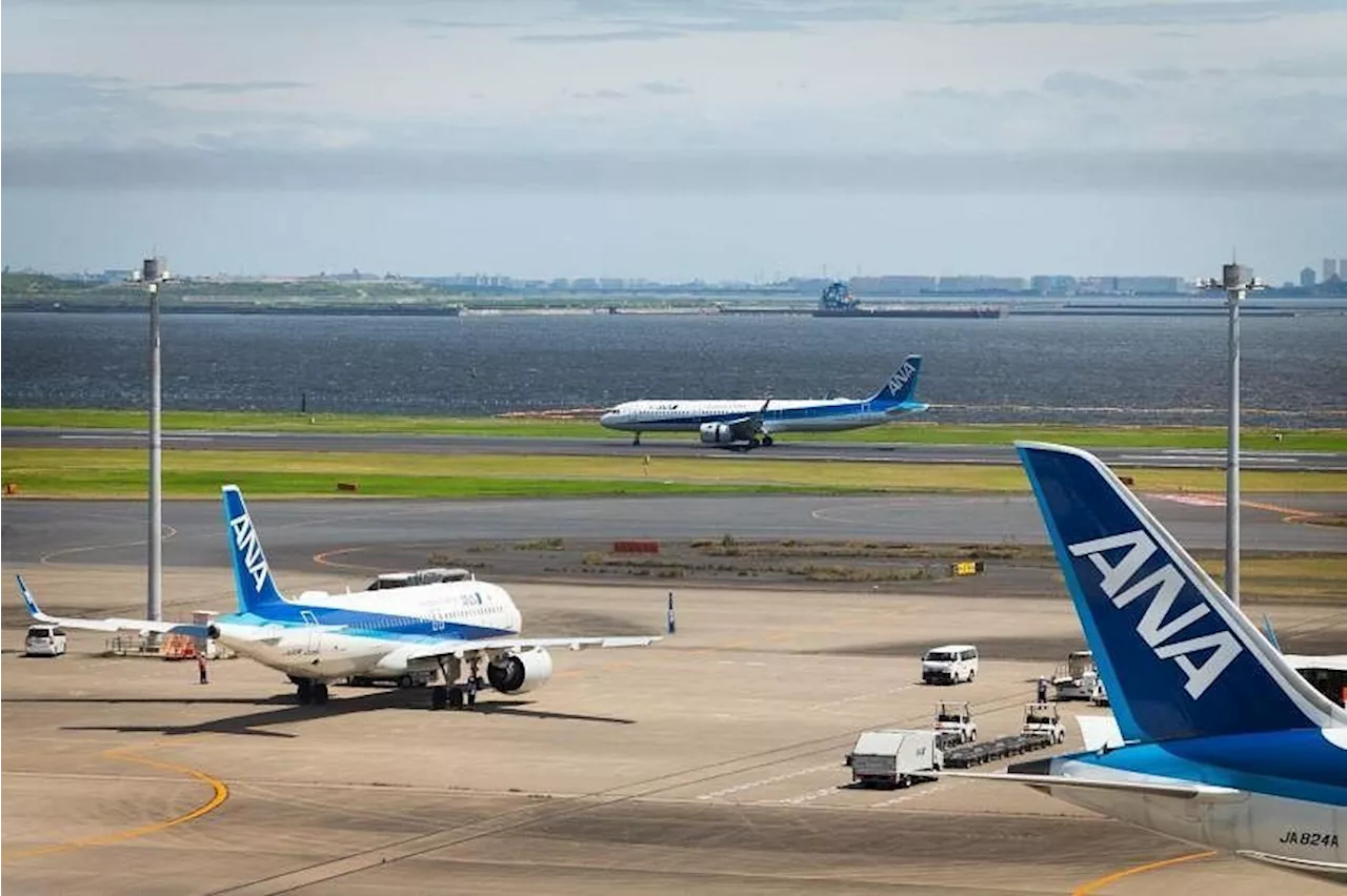 Severe typhoon Ampil approaching Japan disrupts flights, trains