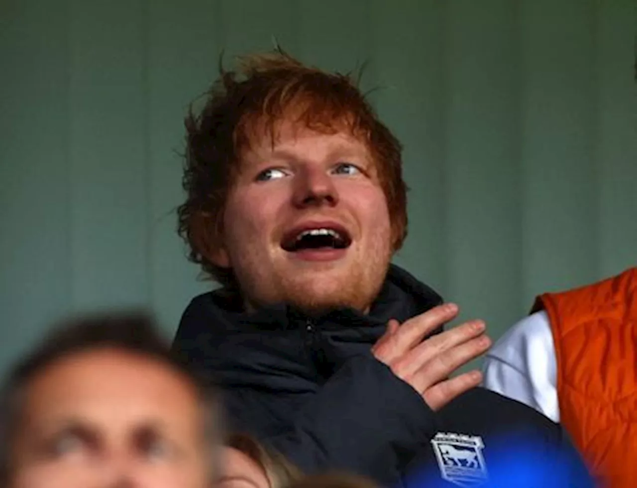 Soccer-Ed Sheeran buys minority stake in hometown club Ipswich