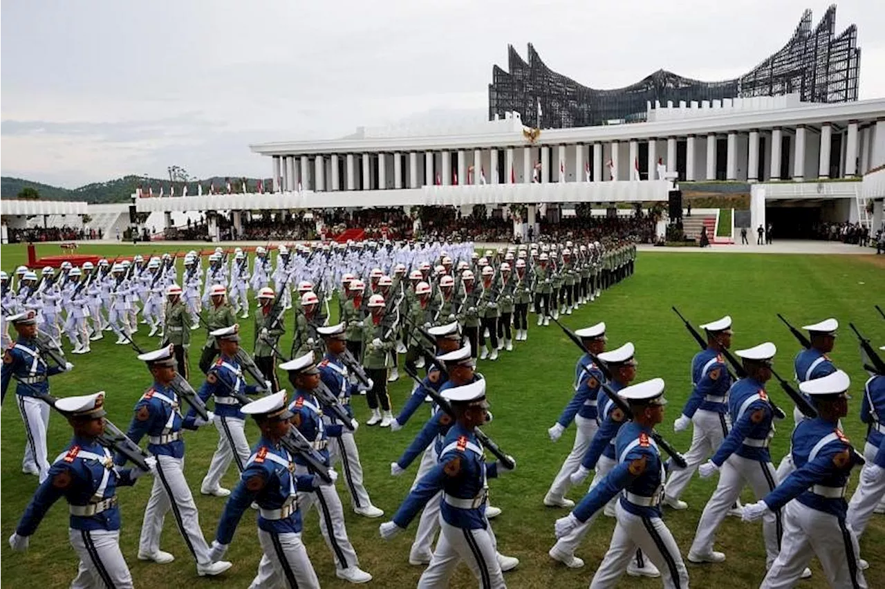 Indonesia holds curtailed Independence Day event in troubled new capital