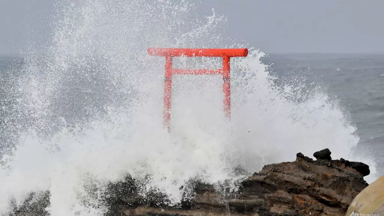 Typhoon Ampil veers away from Japan, allowing trains, some flights to resume