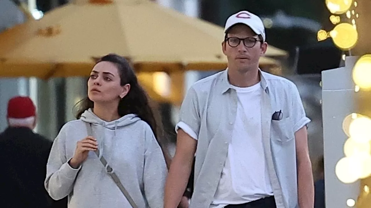 Ashton Kutcher and wife Mila Kunis hold hands on a casual dinner date with friends in Beverly Hills