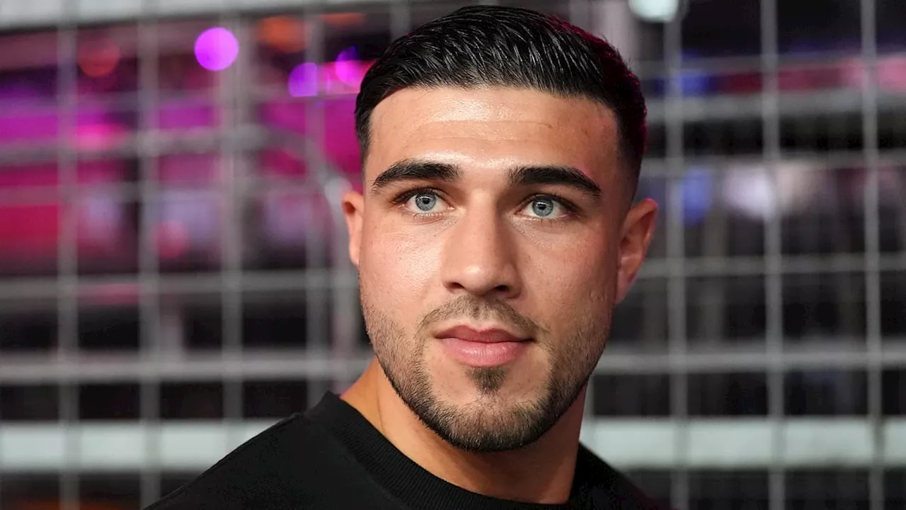 Tommy Fury 'spotted brazenly kissing blonde as he downed vodka during boozy night out' before...