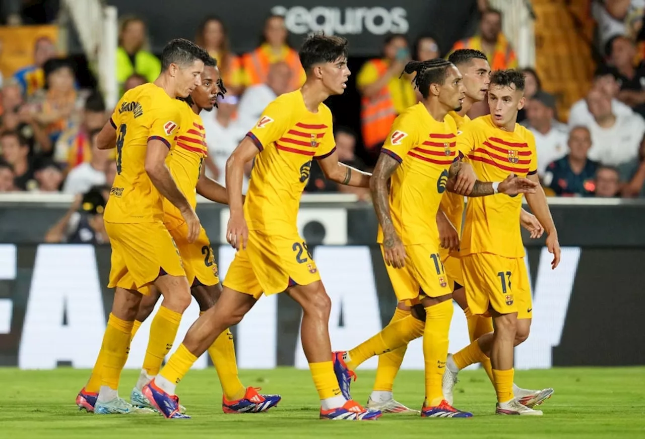 Lewa guides Barca to comeback win in Flick's first game