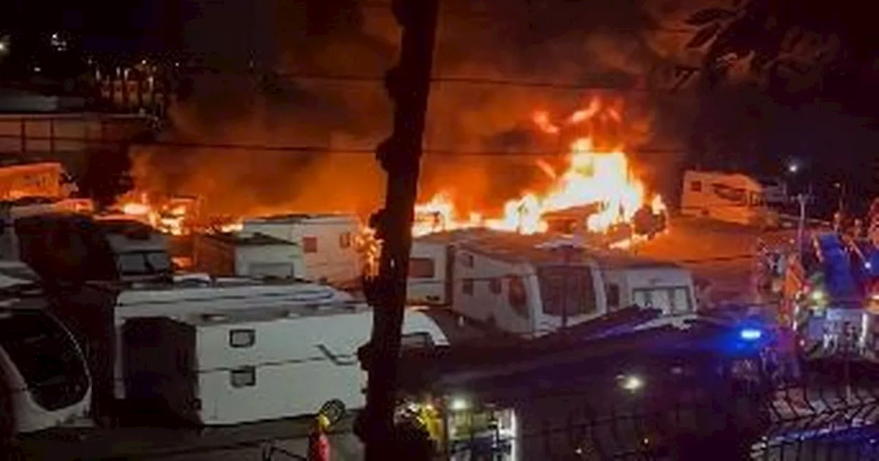 Huge fire breaks out at caravan storage yard in Oldham