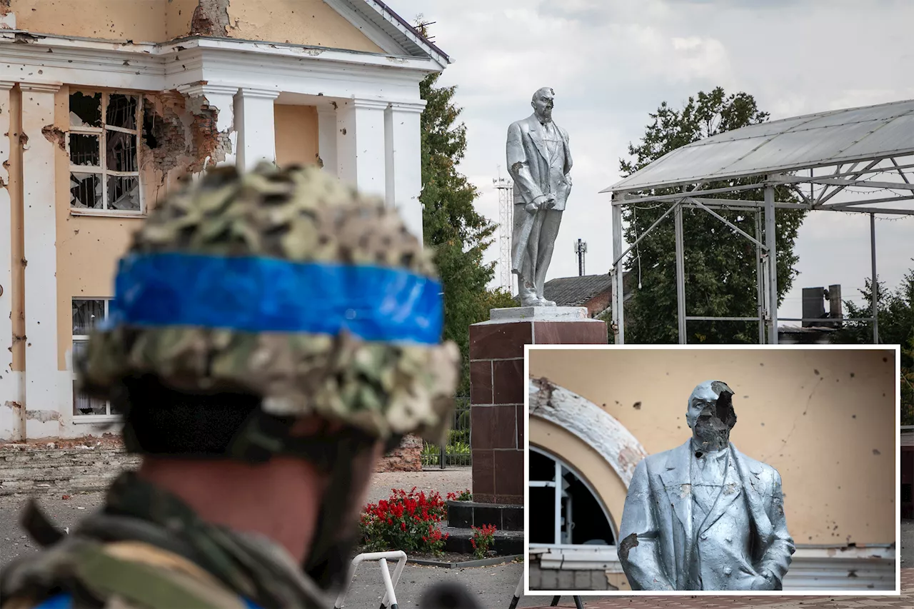 Ukrainian forces topple statue of Lenin after taking control of Russian town