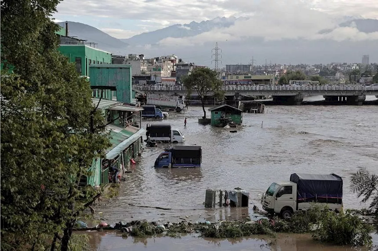 Nepal flood waters smash through village