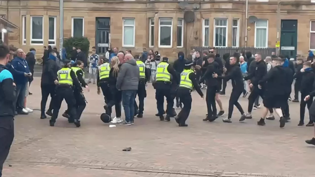 Shocking moment Rangers fans clash with police at Hampden ahead of St Johnstone cup clash as woman knocked...