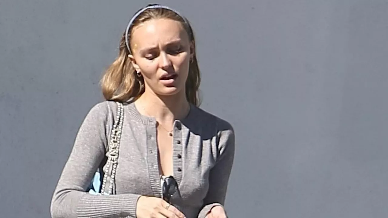 Lily-Rose Depp beats the LA heat wearing a white mini-dress as she shops for party supplies