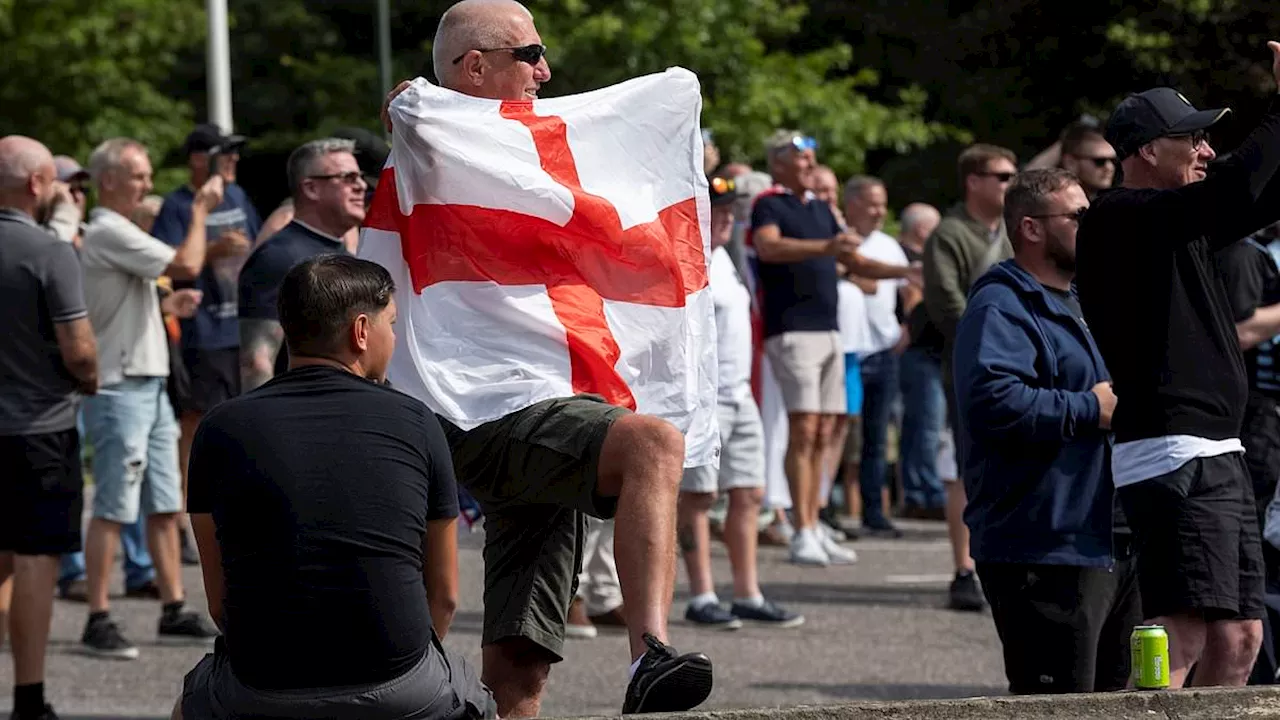 Rival anti-immigration marchers and counter protest rally face off in Bournemouth amid heavy police...