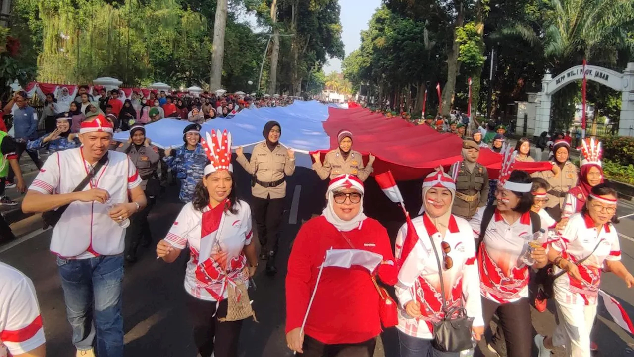 Kemeriahan Kirab Bendera Merah Putih Raksasa Semarakkan HUT ke-79 RI di Kota Bogor