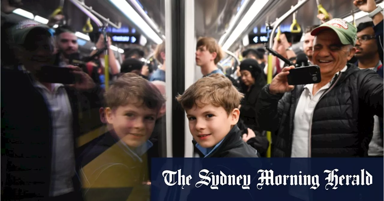 On board the 4.54 metro train under Sydney Harbour and into the history books