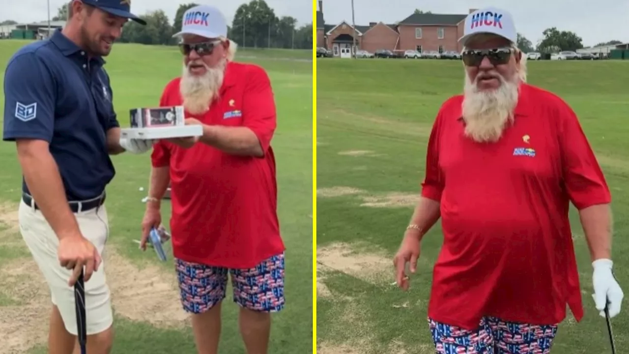 John Daly plays barefoot golf with Bryson DeChambeau while smoking and drinking, then gifts him box of...