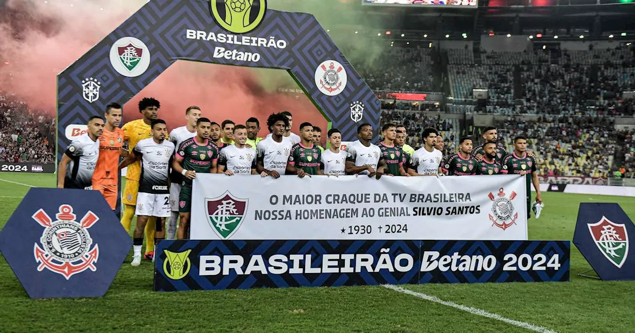 Flores em mansão, faixa em jogo e 'caravana' em cemitério: fãs prestam homenagens a Silvio Santos