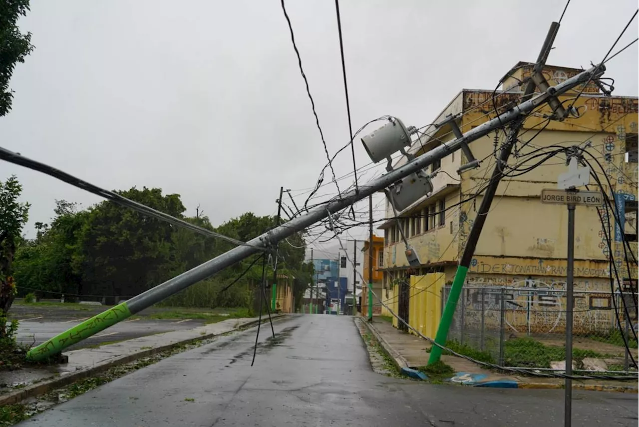 Hurricane Ernesto downgraded to storm