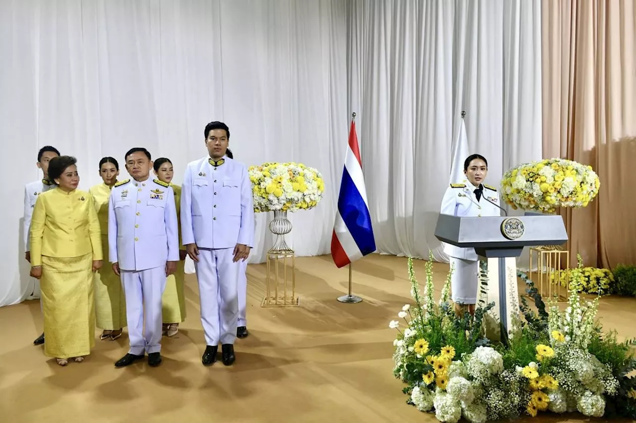 New Thai PM takes office vows change