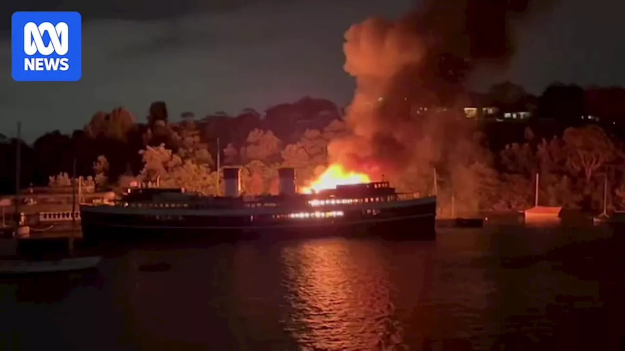 Barge catches on fire at Berrys Bay in Sydney Harbour near heritage-listed SS South Steyne