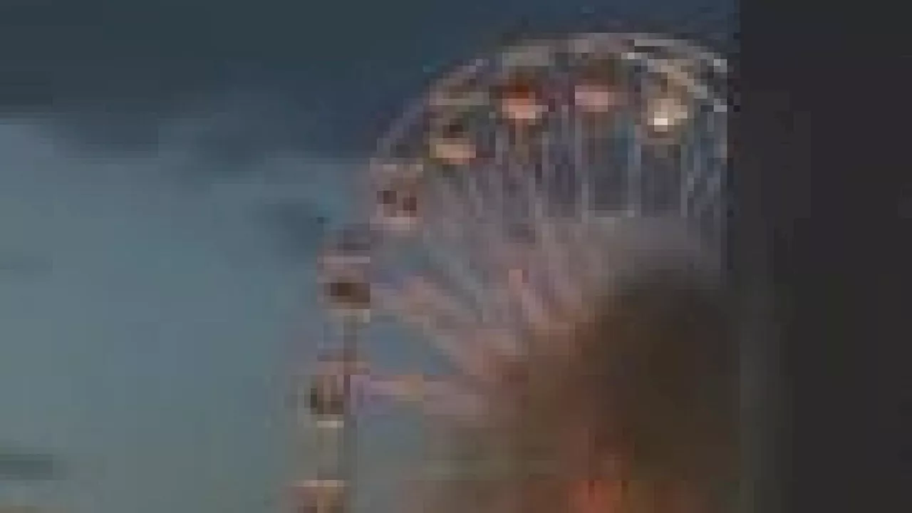 More than 20 injured after two gondolas on Leipzig ferris wheel catch fire