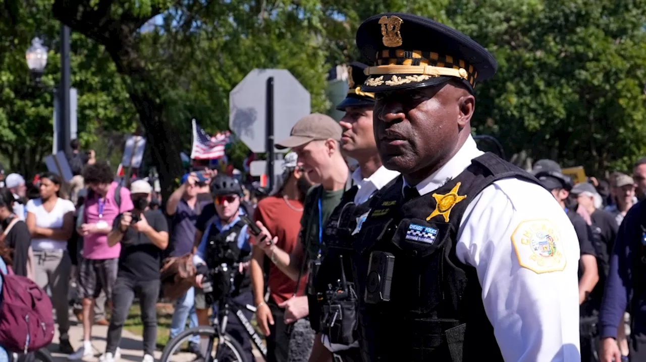 Protesters break through police fence near site of Democratic National Convention