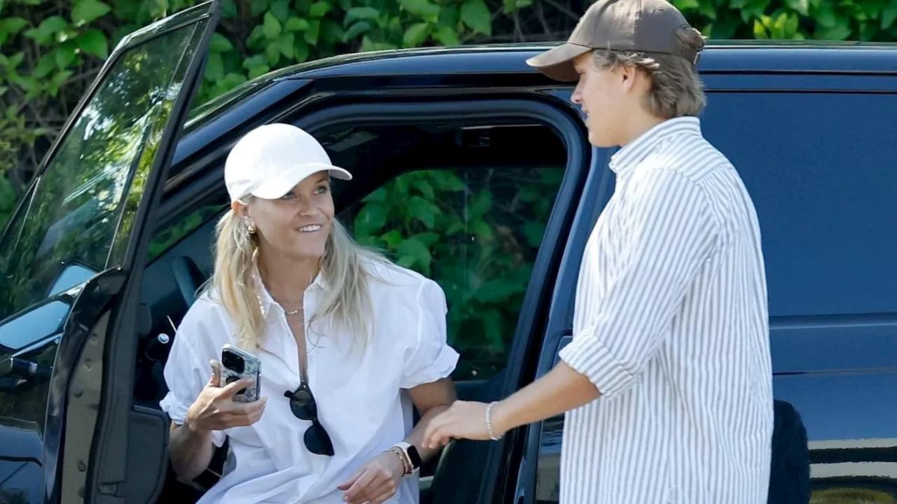 Reese Witherspoon and son Deacon match in preppy outfits for Sunday fun while her rumored secret...